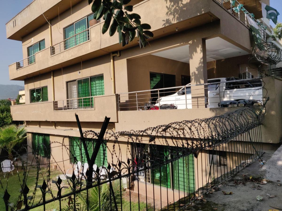 The Travelers Den Hotel Islamabad Esterno foto