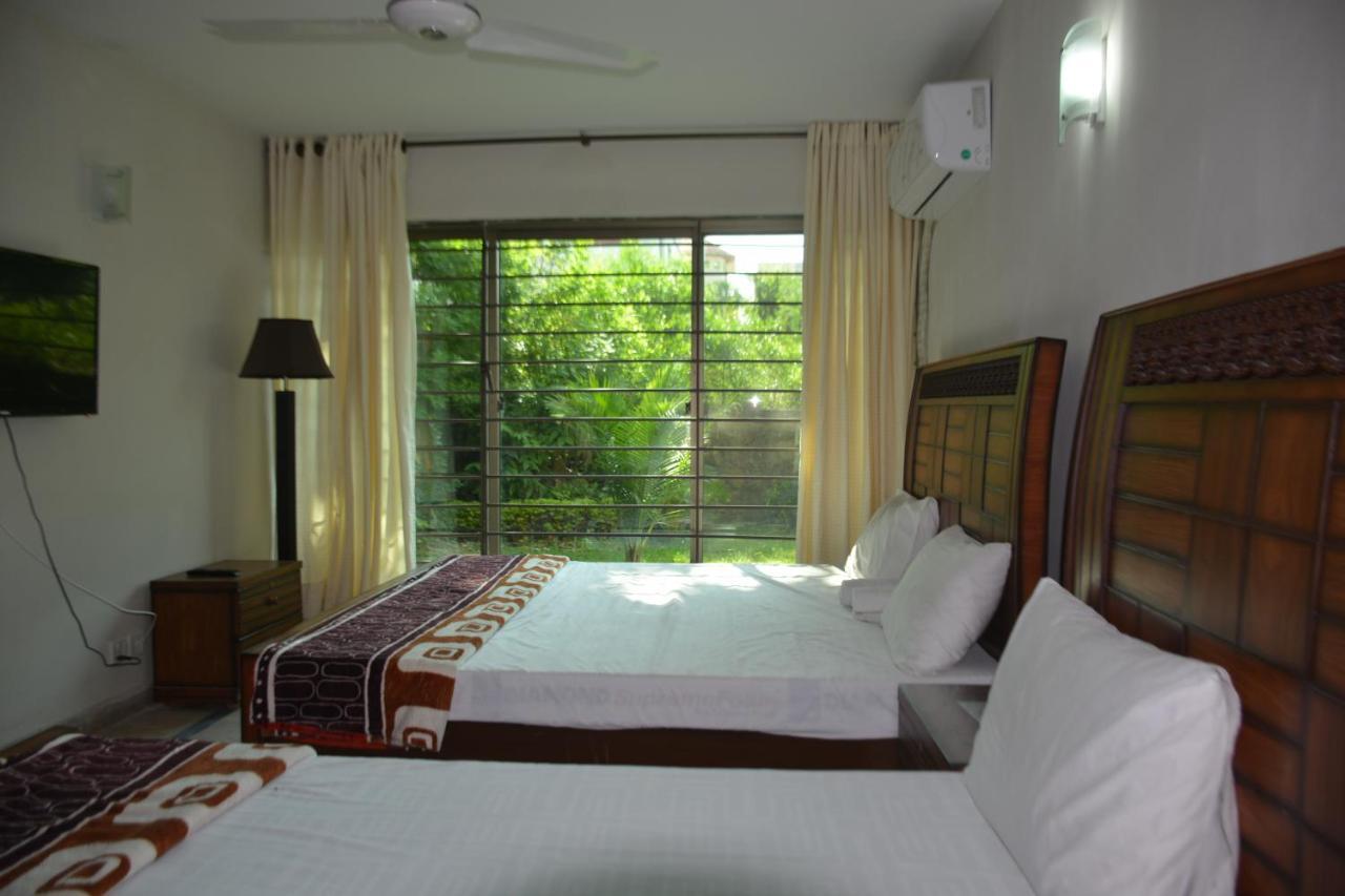 The Travelers Den Hotel Islamabad Esterno foto