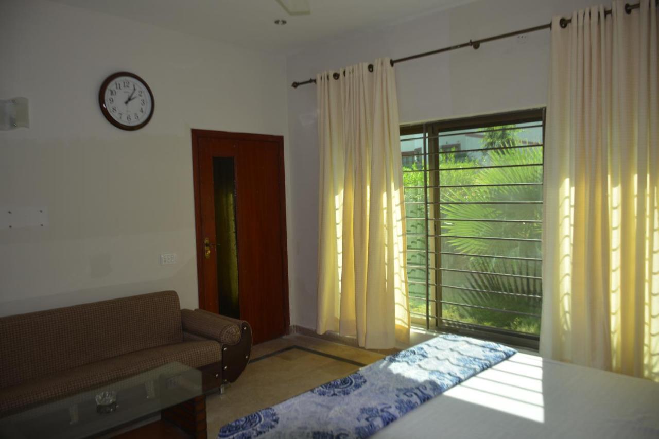 The Travelers Den Hotel Islamabad Esterno foto