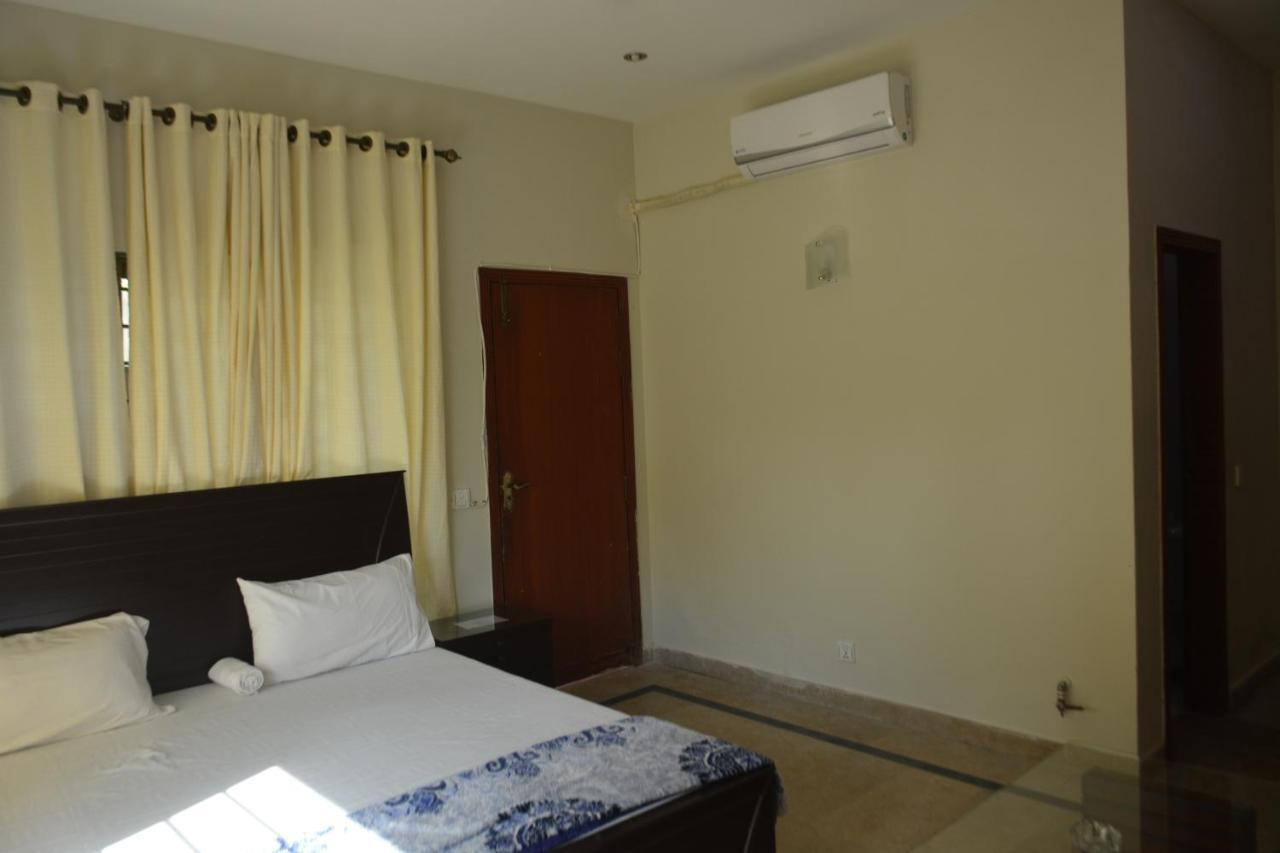 The Travelers Den Hotel Islamabad Esterno foto