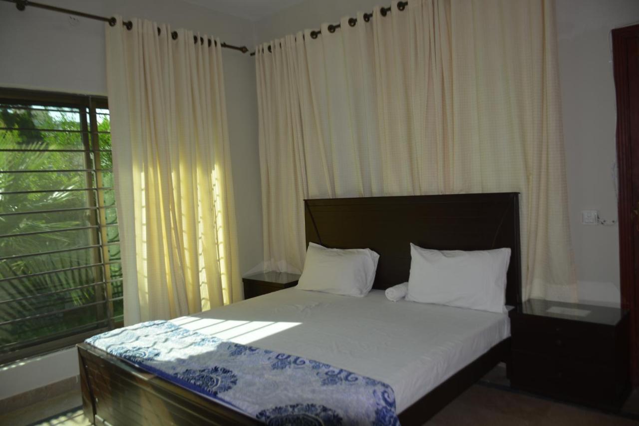 The Travelers Den Hotel Islamabad Esterno foto