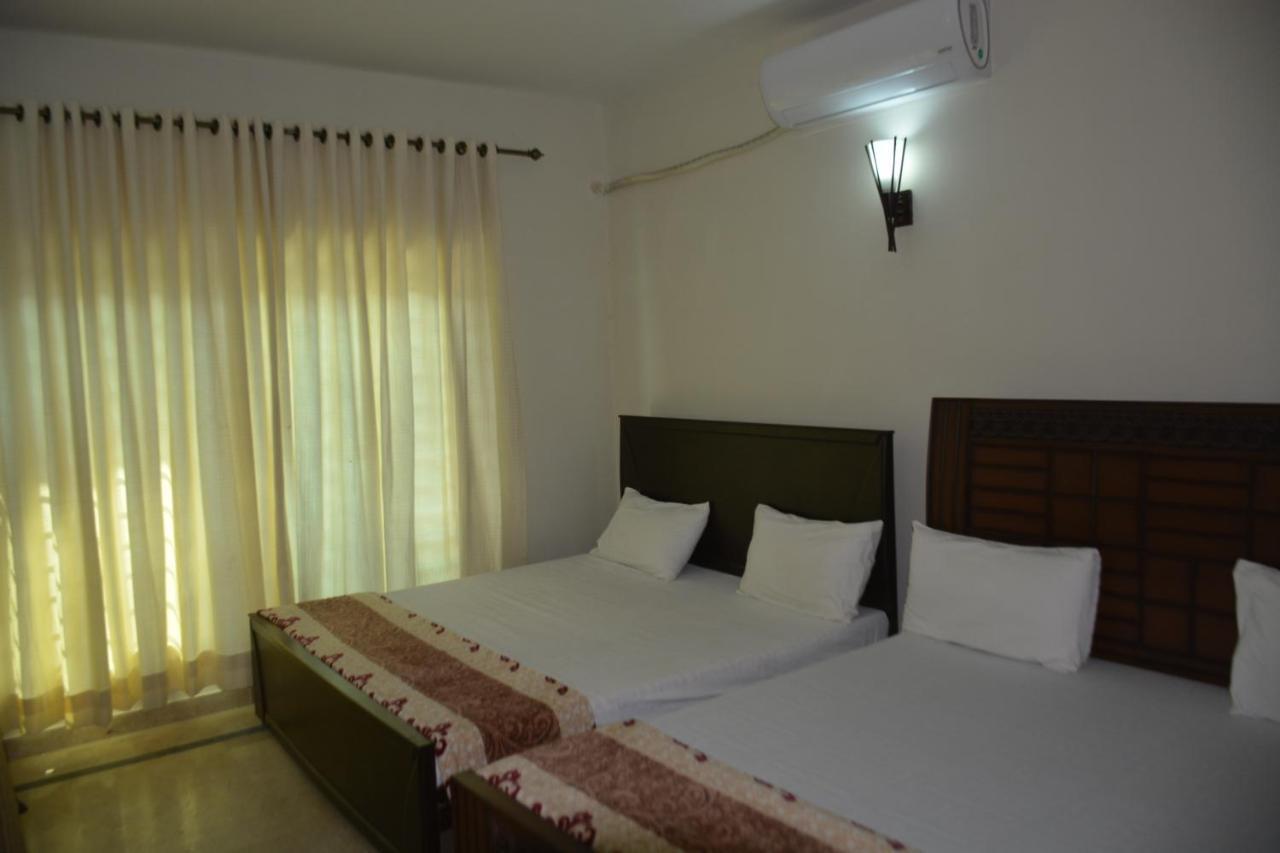 The Travelers Den Hotel Islamabad Esterno foto