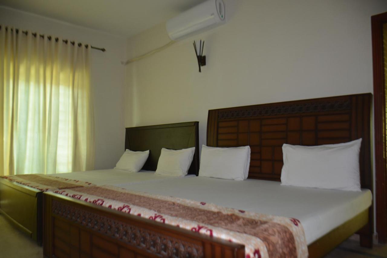 The Travelers Den Hotel Islamabad Esterno foto