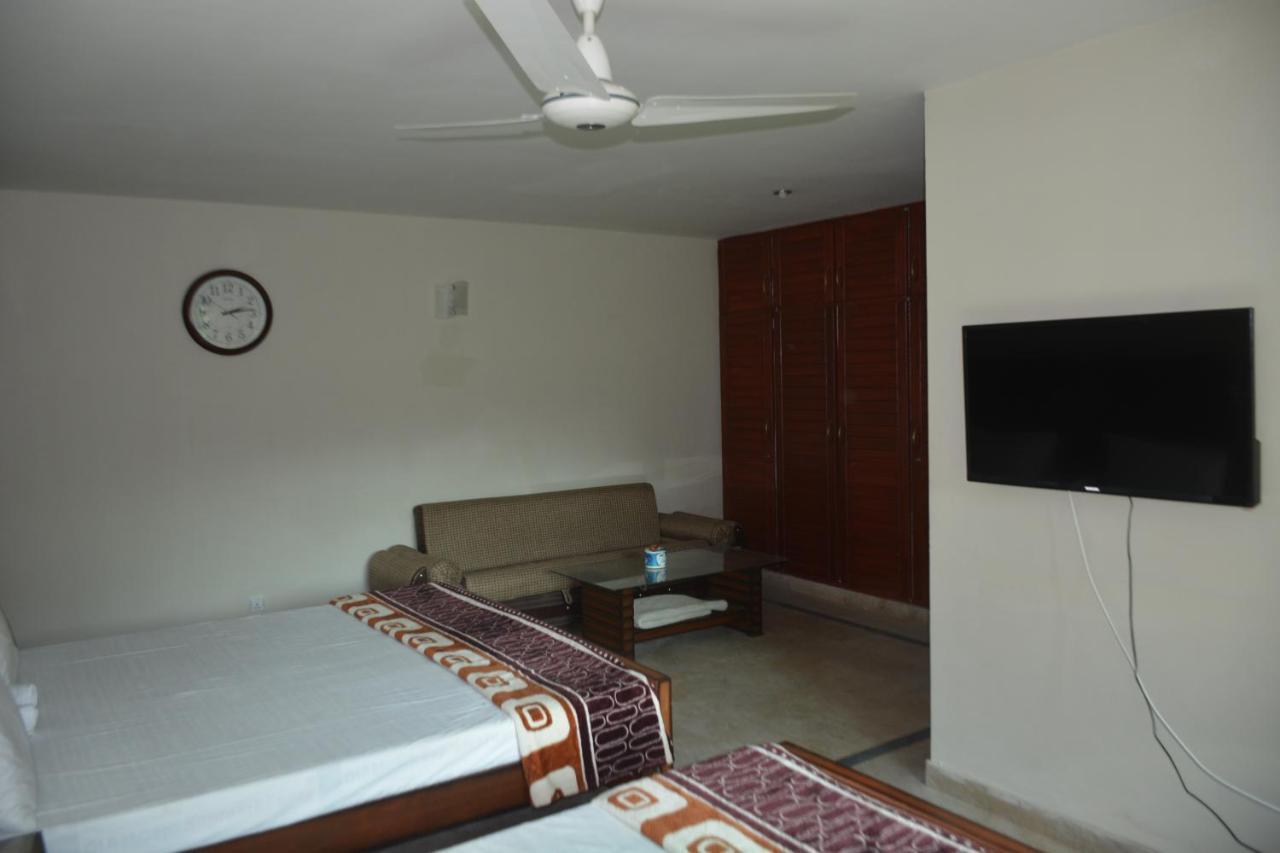The Travelers Den Hotel Islamabad Esterno foto