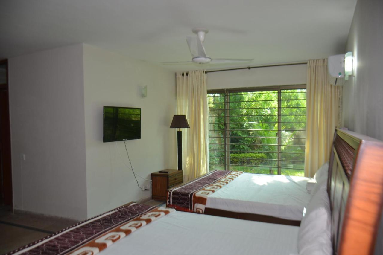 The Travelers Den Hotel Islamabad Esterno foto