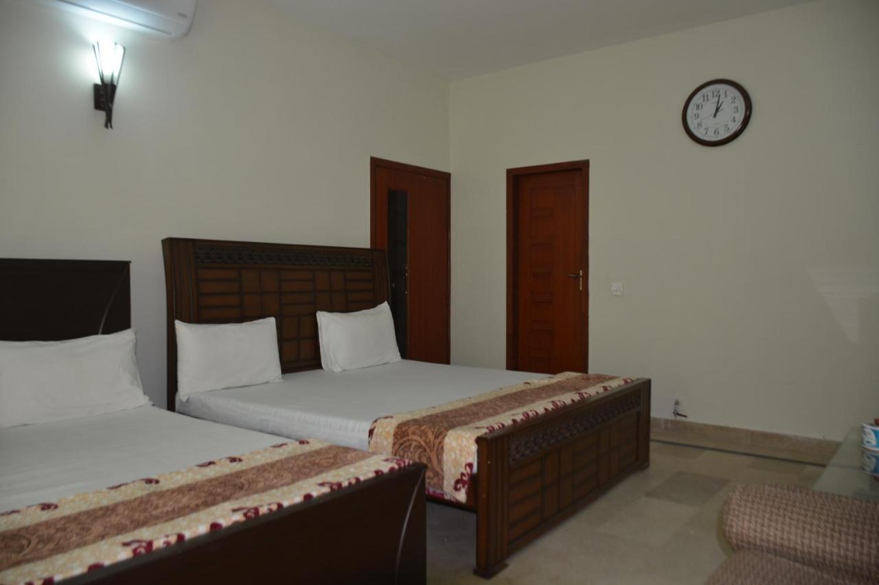The Travelers Den Hotel Islamabad Esterno foto