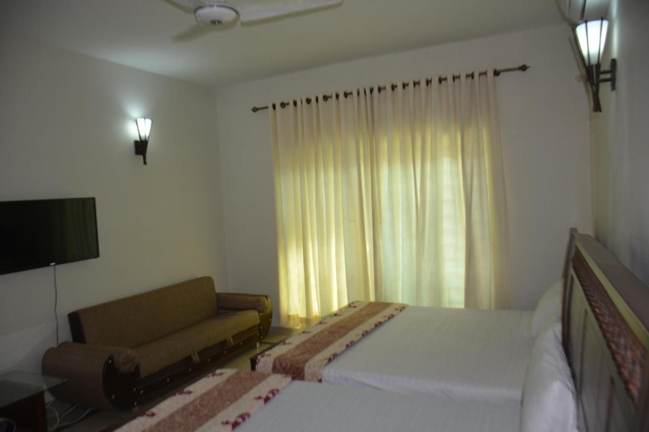 The Travelers Den Hotel Islamabad Esterno foto