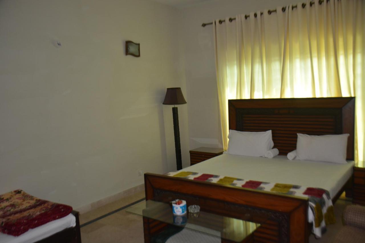 The Travelers Den Hotel Islamabad Esterno foto